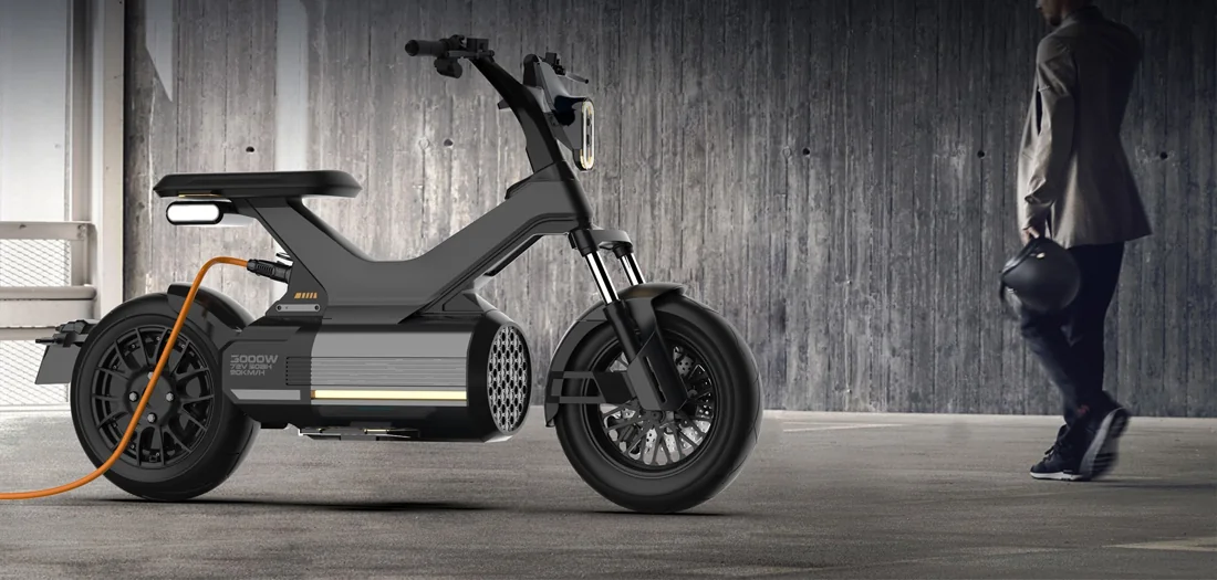 PXID PX-4 electric motorcycle connected to a charger